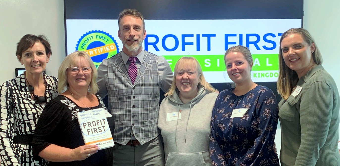 The Accounts Ladies team with Mike Michalowicz, the creator of Profit First