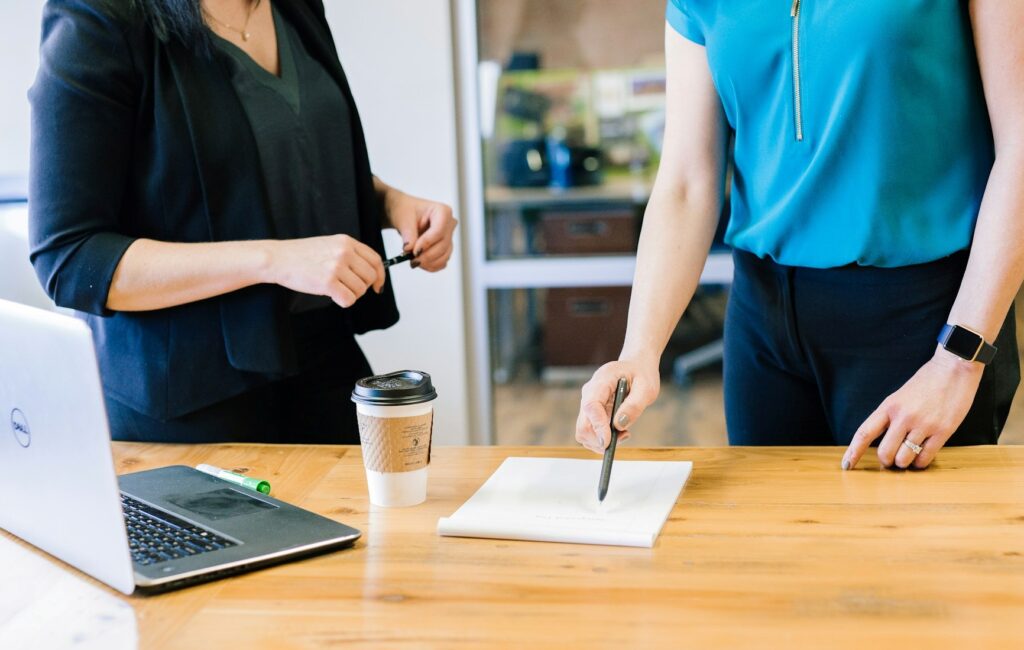 Two women collaborating on a business project